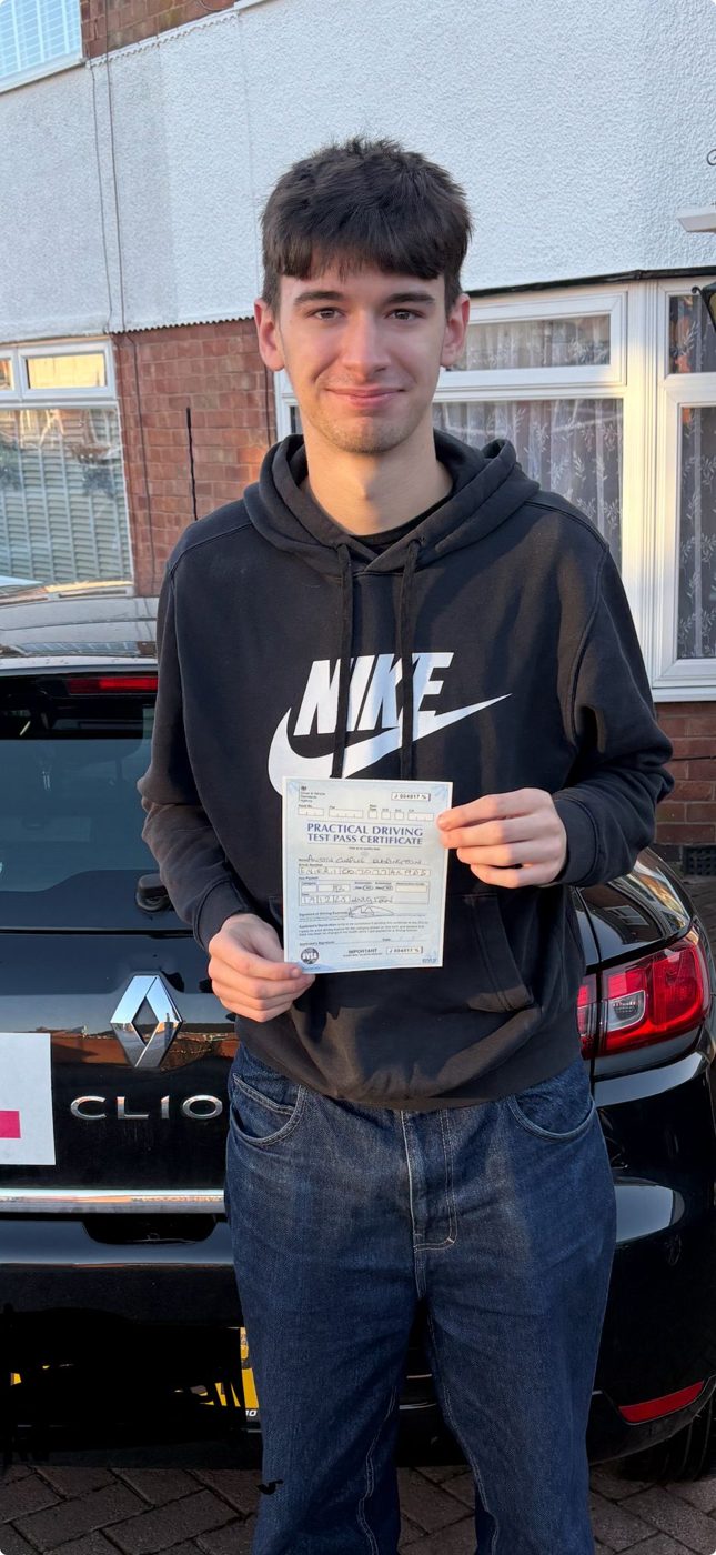Young driver with his practical driving test pass certificate in Leicester