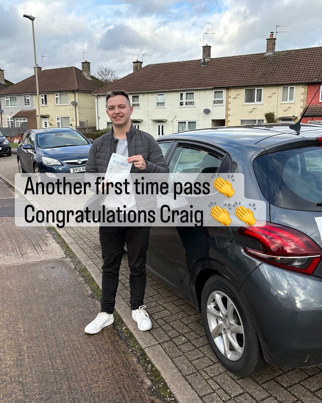 Craig celebrating another first-time driving test pass in Leicester