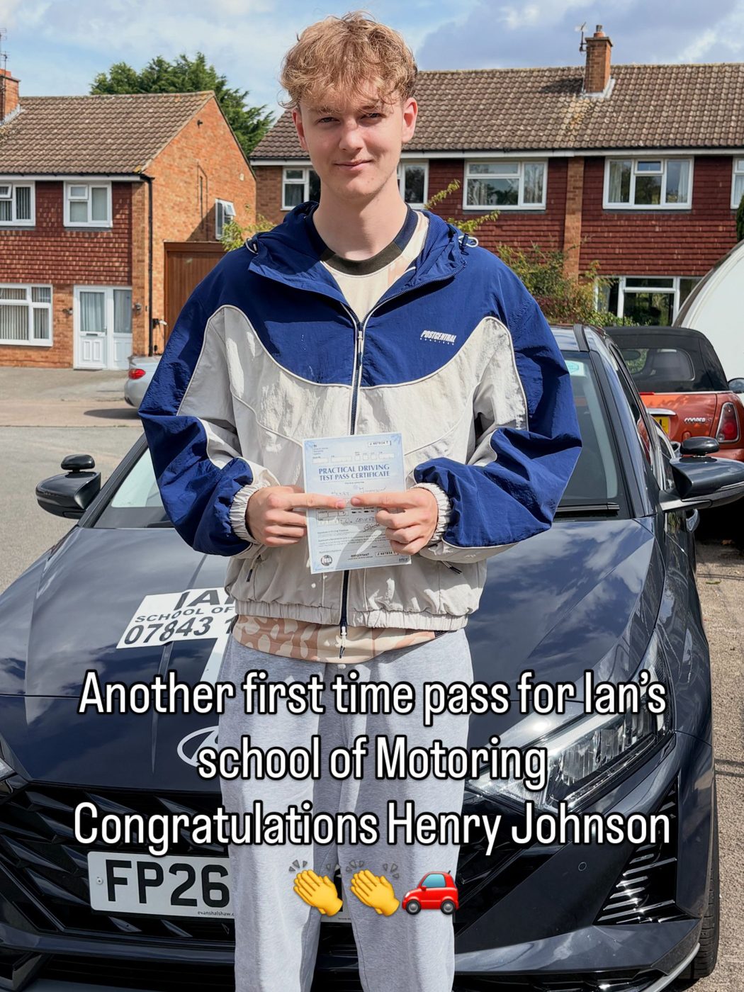 Henry Johnson celebrating a first-time pass with Ian's School of Motoring